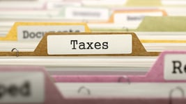 Taxes Concept on File Label in Multicolor Card Index. Closeup View. Selective Focus.