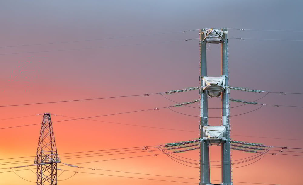 high-voltage-power-transmission-line-on-sunset-PD463HB