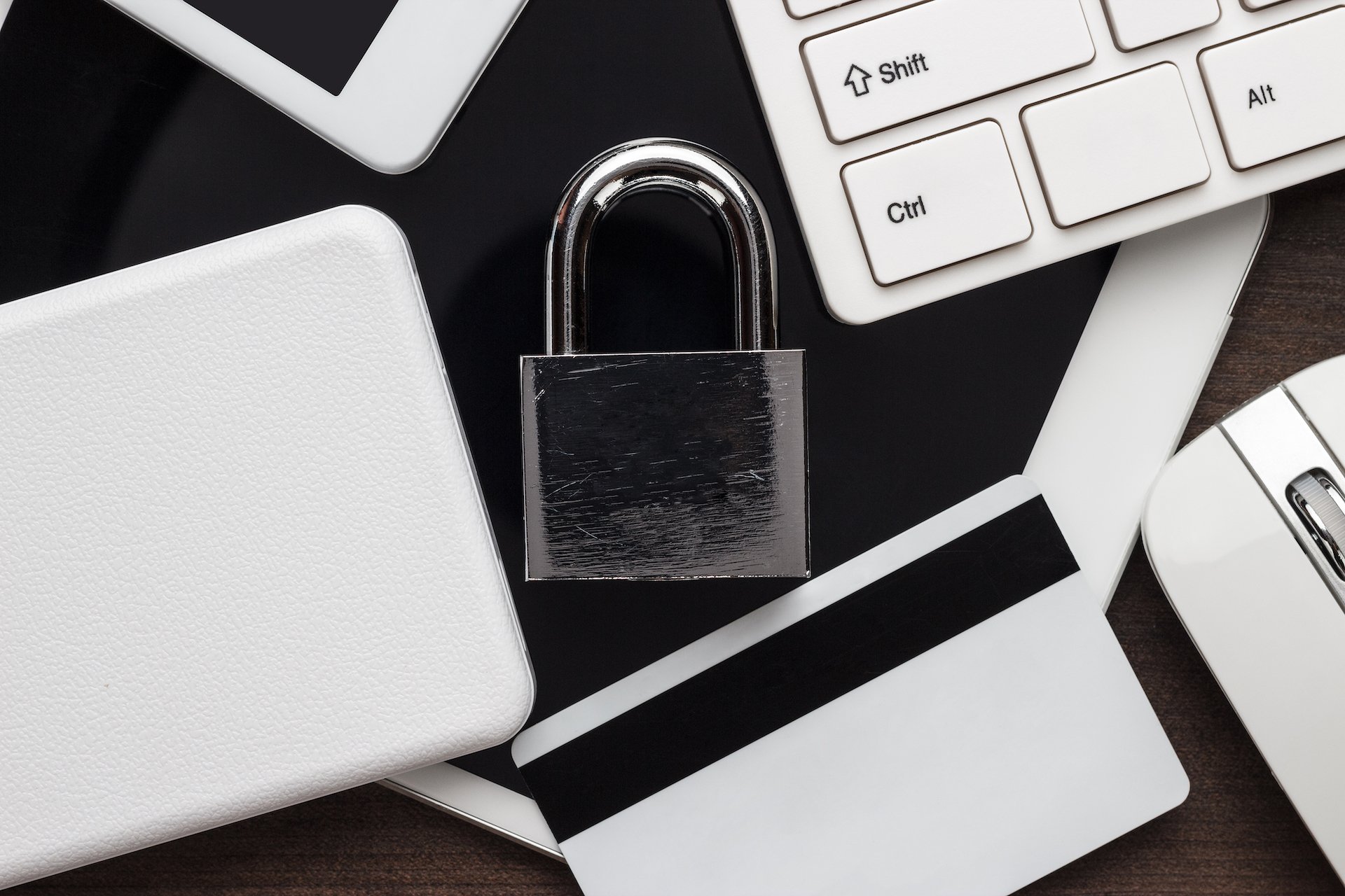 padlock-and-different-gadgets-on-the-wooden-PJR2ZPC