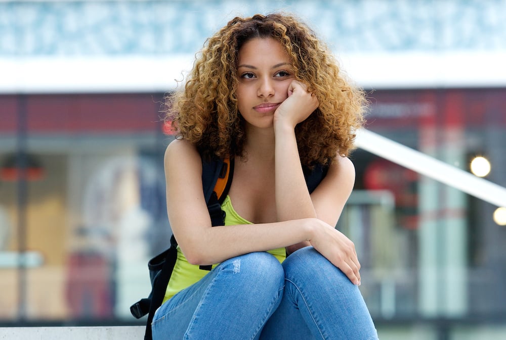 student-with-grumpy-expression-PDZ6H6W