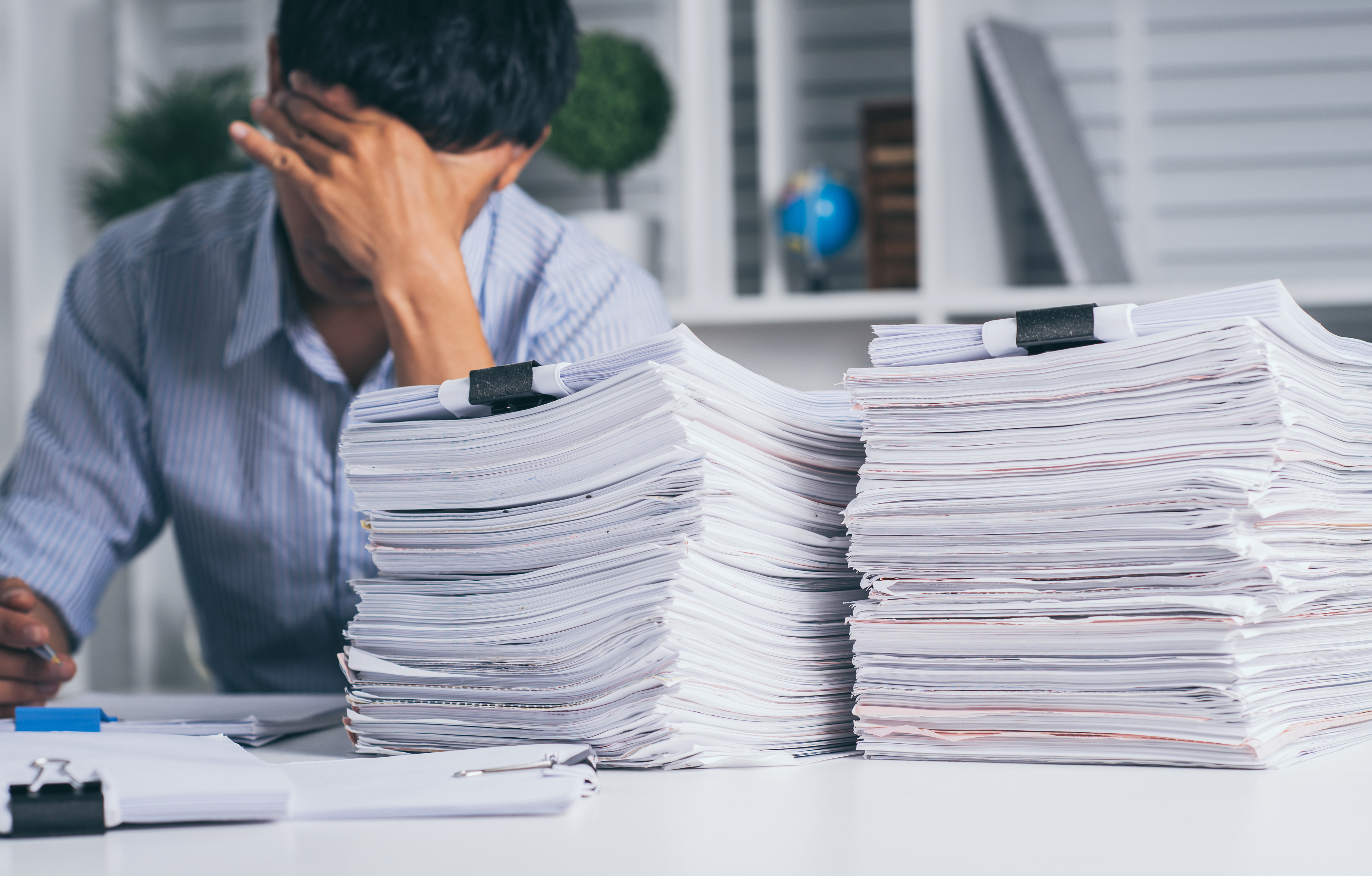 Stressed out man sales tax filing